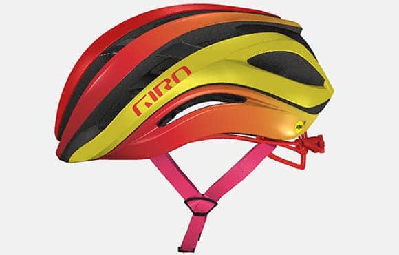 a red, orange, yellow, and pink bicycle helmet with the word "giro" written on it in red letters.