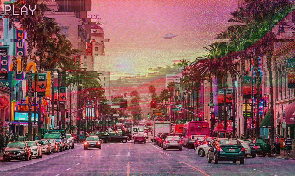 hollywood boulevard and palm trees at sunset